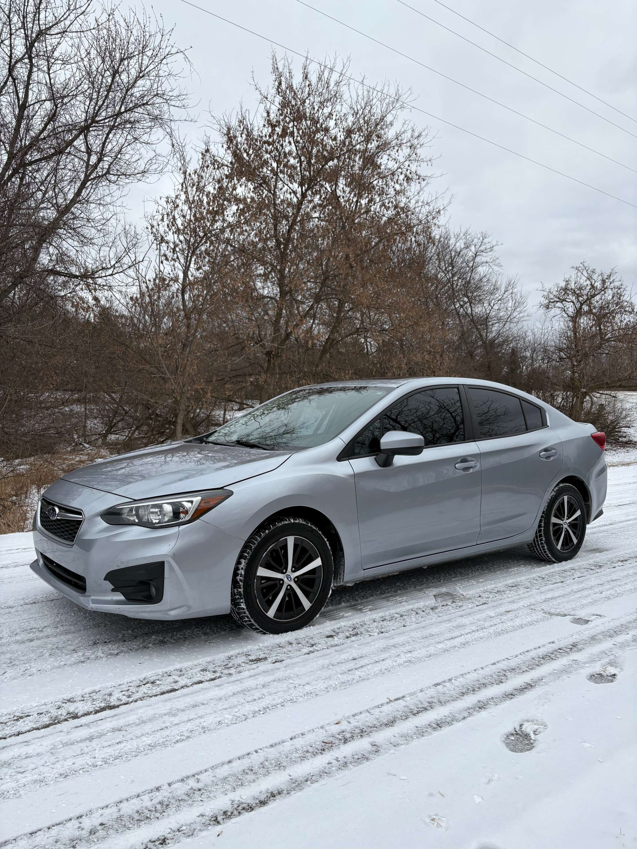 2019 Subaru Impreza Premium AWD 4D Sedan at 2.0 4cyl. Gasoline