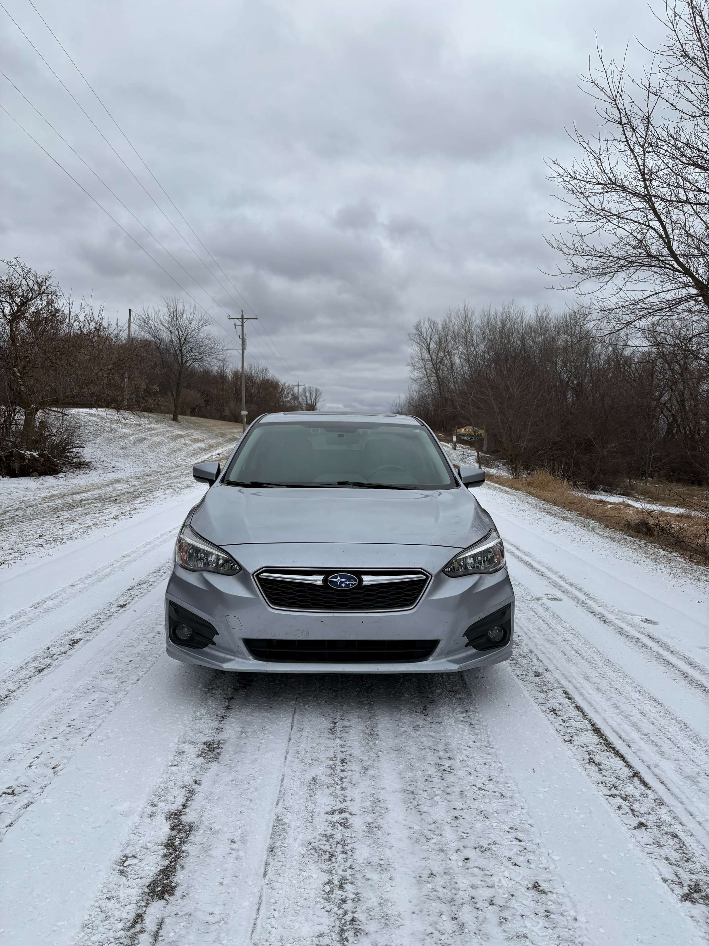 2019 Subaru Impreza Premium AWD 4D Sedan at 2.0 4cyl. Gasoline