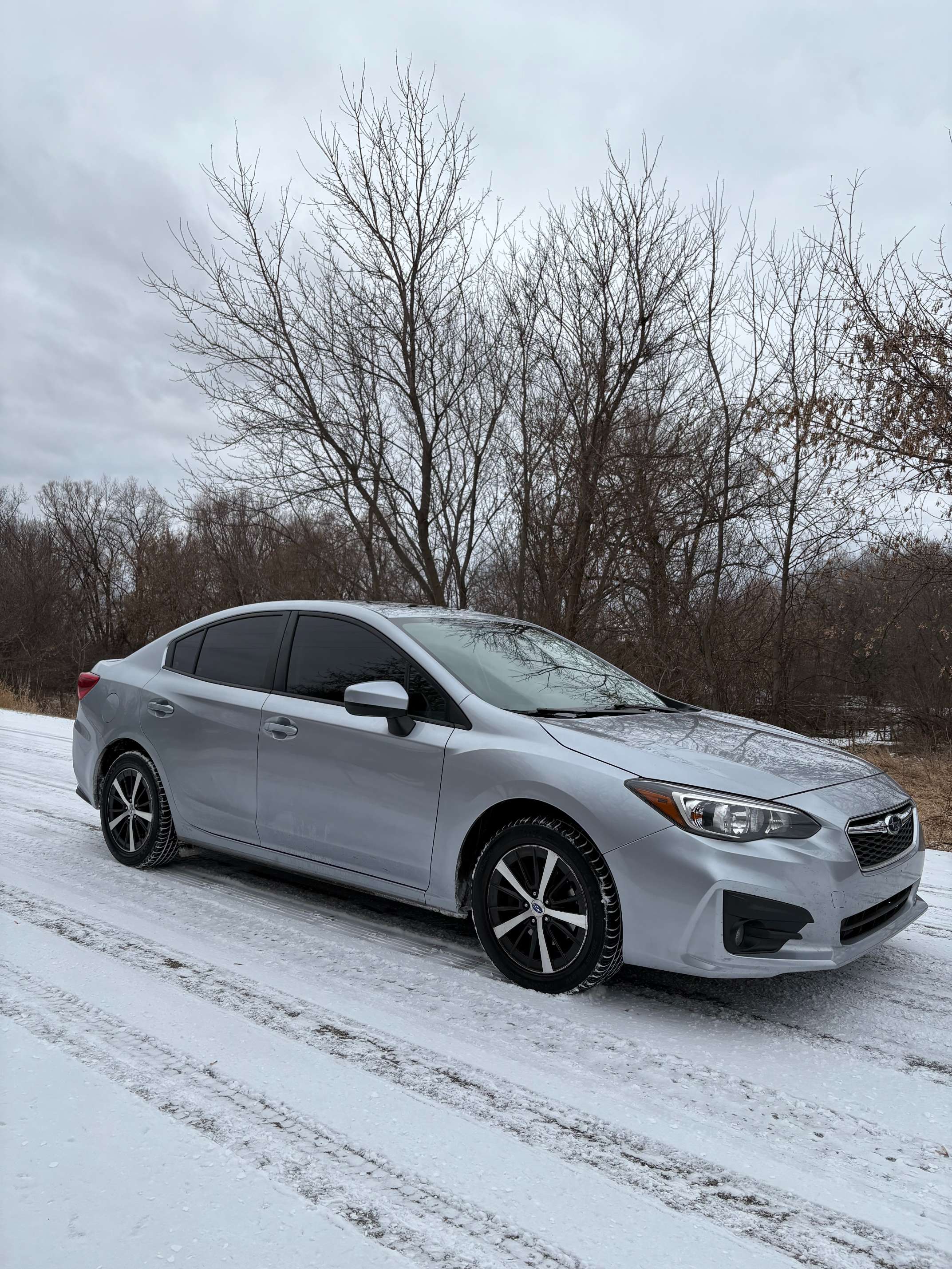 2019 Subaru Impreza Premium AWD 4D Sedan at 2.0 4cyl. Gasoline